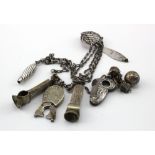 Unmarked silver chatelaine (probably French). Marked "Depose" with pierced and engraved flowers with
