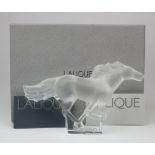 Lalique. A Lalique frosted crystal model of a galloping horse, height 11.5cm approx., contained in