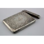 Silver card case, very attractive floriate design. Initialled C.G. in front. Hallmarked J.R.