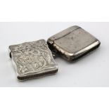 Two silver vesta cases, one plain and one attractively engraved, hallmarked Birmingham 1903 and