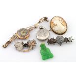 Mixed lot consisting of 9ct mechanical ladies wrist watch, weight 16.9g. 9ct cameo brooch, weight