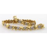 18ct yellow gold bracelet with alternating gold and diamond set links, box clasp with safety