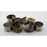 Nine silver napkin rings, various British hallmarks. Weight of silver 6oz approx.