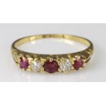 18ct ruby and diamond five stone graduated ring, finger size N, weight 2.4g