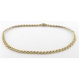 9ct yellow gold three row panther link necklace with box clasp and safety catch, weight 16.6g