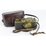 Leica copy. A Leica DRP copy by Fed or Zorki (?), no. 40234, in a fitted leather case (untested,