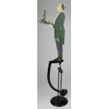 Advertising. An unusual cast iron waiter advertising piece on a stand with weighted pendulum