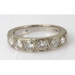 18ct white gold diamond seven stone graduated half eternity ring, finger size J, weight 4.6g