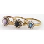 Three 9ct diamond and gem set cluster rings, weight 6.4g