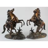 Marley Horses. A pair of large spelter marley horse statues, height 39cm approx. (sold as seen)