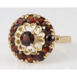 9ct Gold Garnet Floral style Ring size N weight 4.1g