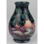 Moorcroft vase, circa 2000s, with mountain & tree decoration (pattern name unknown), printed and