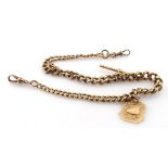 9ct gold "T" bar pocket watch chain with sporting? medal attached. Approx length 36cm, total
