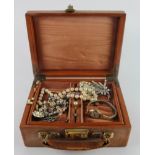 Jewellery case with assorted mixed jewellery to include gold, silver and costume jewellery and a