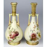 Royal Worcester pair of twin handled blush ivory vases, with floral decoration, (no. 942), makers