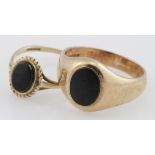 Two 9ct yellow gold onyx set rings, weight 7.2g