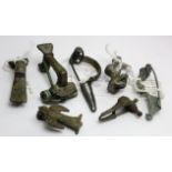 Seven Bronze Roman Brooches. C, 1st to 4th century AD. Various types including a bird brooch with