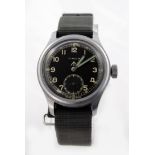 World War II military issue Timor wristwatch "Dirty Dozen" type. Inscribed on the back "^ W.W.W.