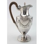 Adam style silver hot water jug with cancelled marks to the base and London Assay Office marks for