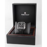 Tag Heuer Monaco automatic wristwatch circa 2006. The square black dial with baton hour markers,