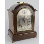 Oak mantle clock, with silvered dial, movement stamped 'W&H SCH', pendulum present, height 30cm,