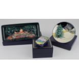 Moorcroft. Three Moorcroft pieces, comprising a small pin dish, circa 2006 (Christmas tree