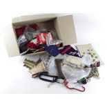 Assorted Militaria in a box - Badges, Buttons, Hackles, Lanyards, Ephemera, Pennant, Bayonet Frog.