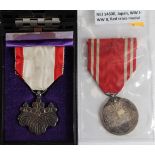 Japan two WW2 awards one a low Order cased the other Red Cross