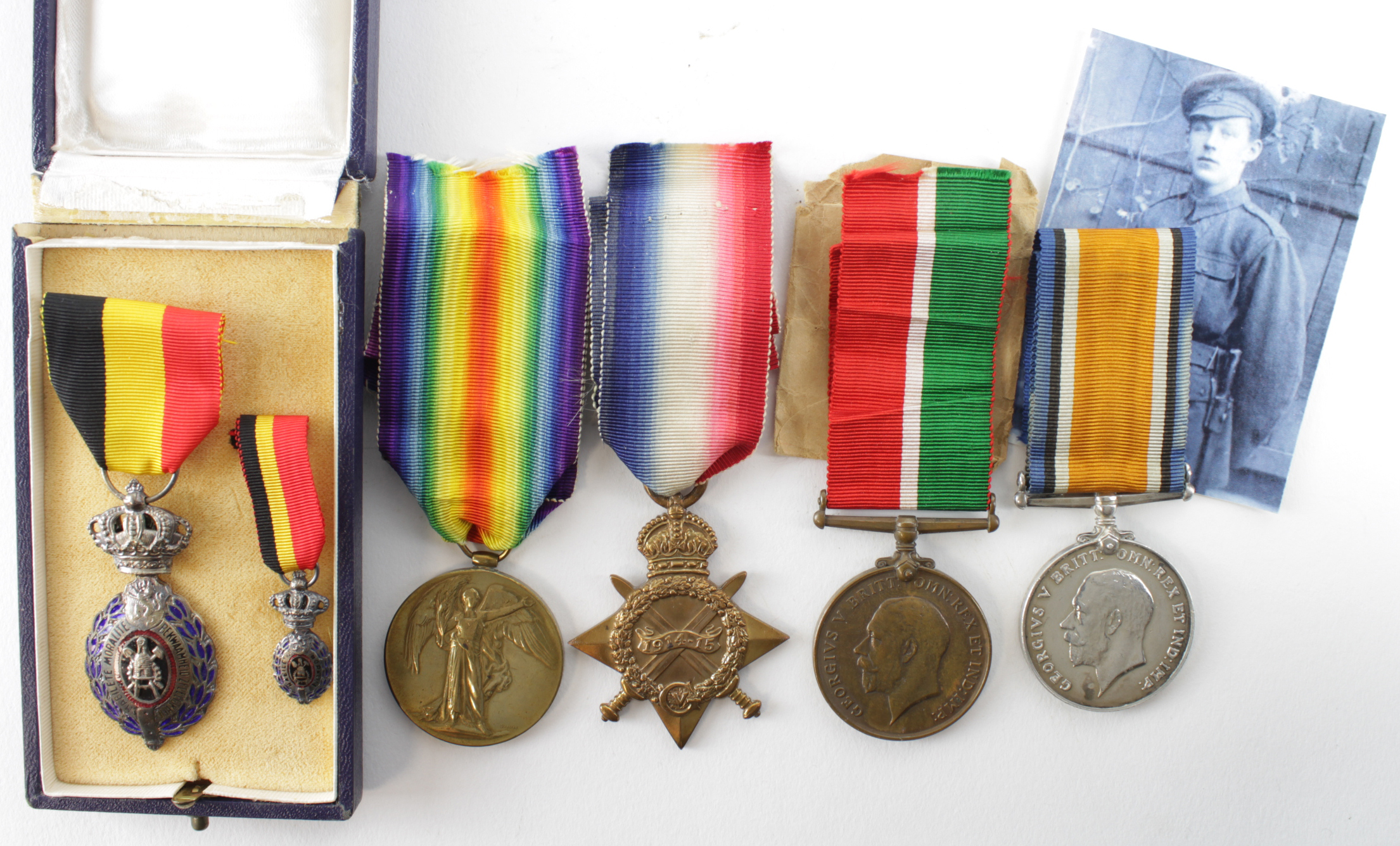 1915 Star Trio (R-4413 Pte H L Bradley K.R.Rif.C.). Mercantile Marine Medal (Ralph V. Scoble) with