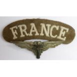 Badge a Free French Forces Parachute beret badge with Cross of Lorraine added to a British Para