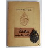 German Tank Battle War badge in bronze with book by tank commander Helmut Bernecker.