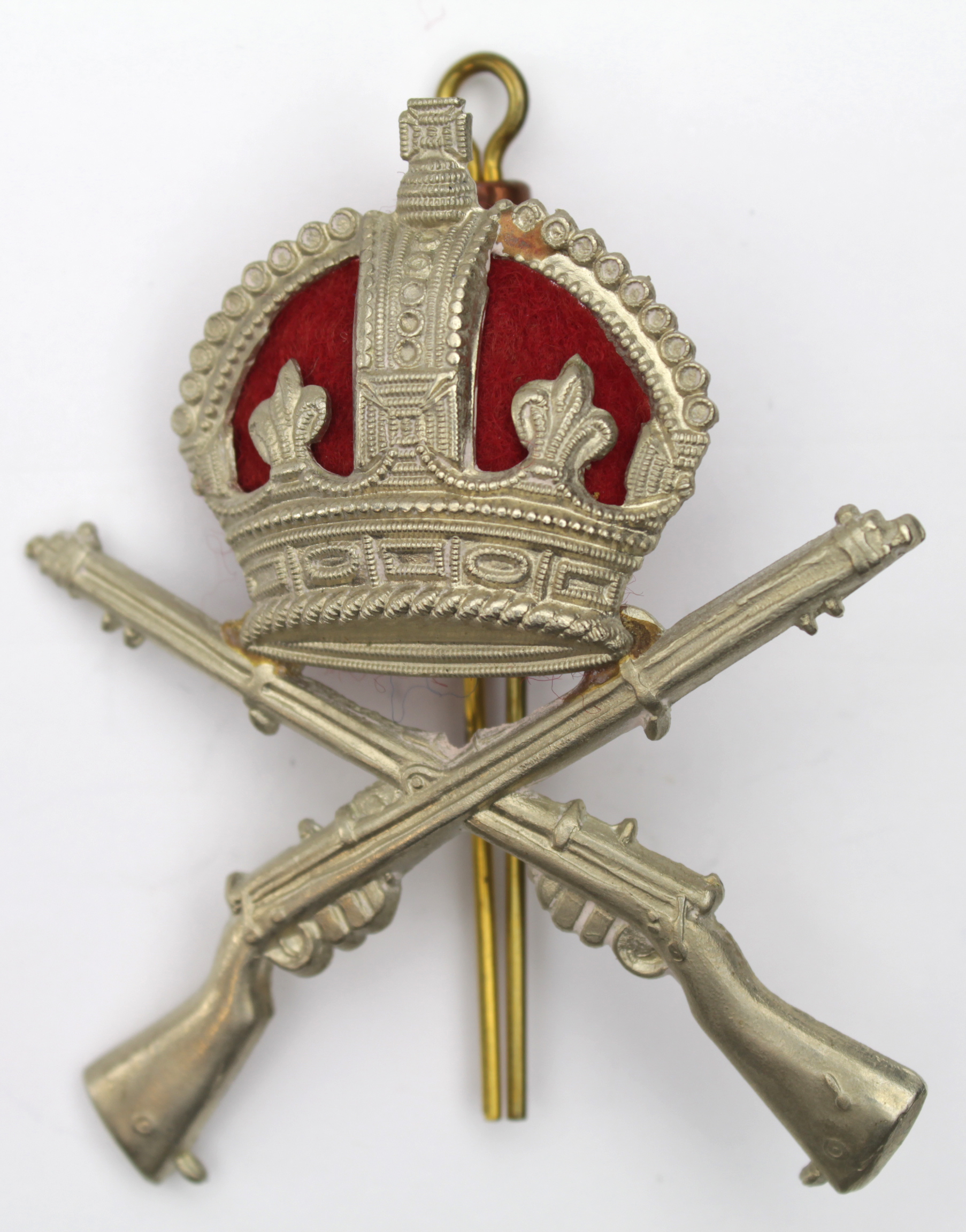 Badge - original School of Musketry white metal & red felt cap badge