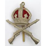 Badge - original School of Musketry white metal & red felt cap badge