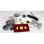 Small box of military badges, medals, and a buckle knife a/f. (Qty)