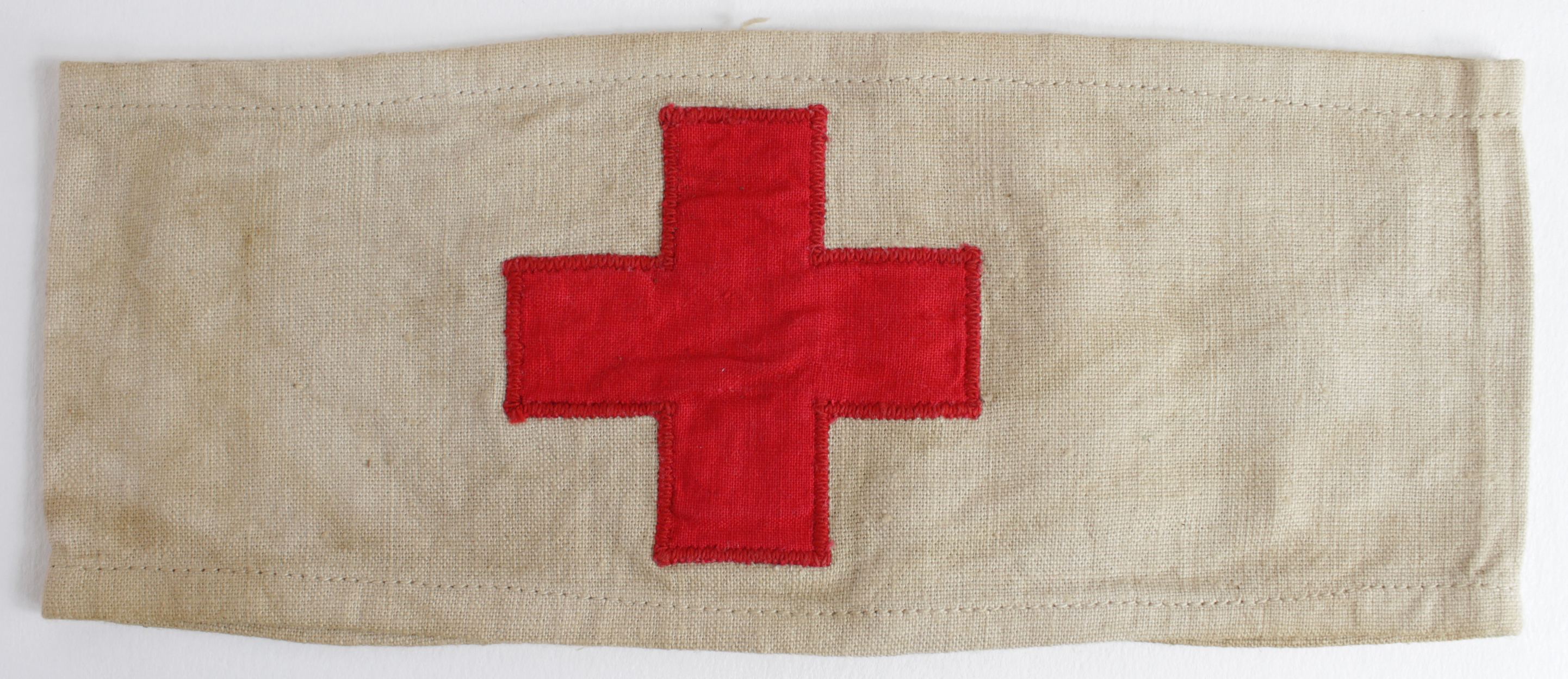 Badge RAF interest an AM 1940 stamped Red Cross armband.