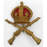 Badge - original School of Musketry brass metal & red felt cap badge