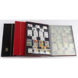 Brown stockbook of GB sets cat £350+, Red stockbook of various sets cat £600+, and a black stockbook