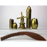 Trench Art items (5) includes 2 bullet shaped brass lighters, a barrel shaped brass vesta, a brass