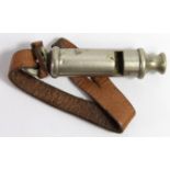 WW1 1916 dated trench whistle made by J Hudson of Birmingham complete with leather lanyard.