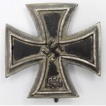 German WW2 convex Iron Cross 1st class solid construction replacement worn with age.