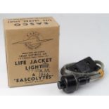 WW2 Style Lancaster bomber bomb release button and boxed life jacket light dated 1944.