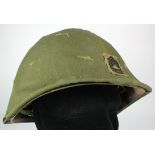 Vietnam War Style A.R.V.N (South Vietnam Army) helmet in an olive drab cover with master sergeants