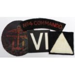 Badges Commando & Royal Marines badges a printed & unused VI sleeve badge, plus combined Ops