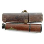 Telescope a leather cased WW1 spotting type scope, wear to finish but optics look ok.