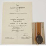 German WW2 West Wall Medal with award document to Feldwebel Karl Springmann.