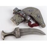 Oman Khanjar / Jamniya Dagger with horn grips, scabbard and handle decorated in silver. Super