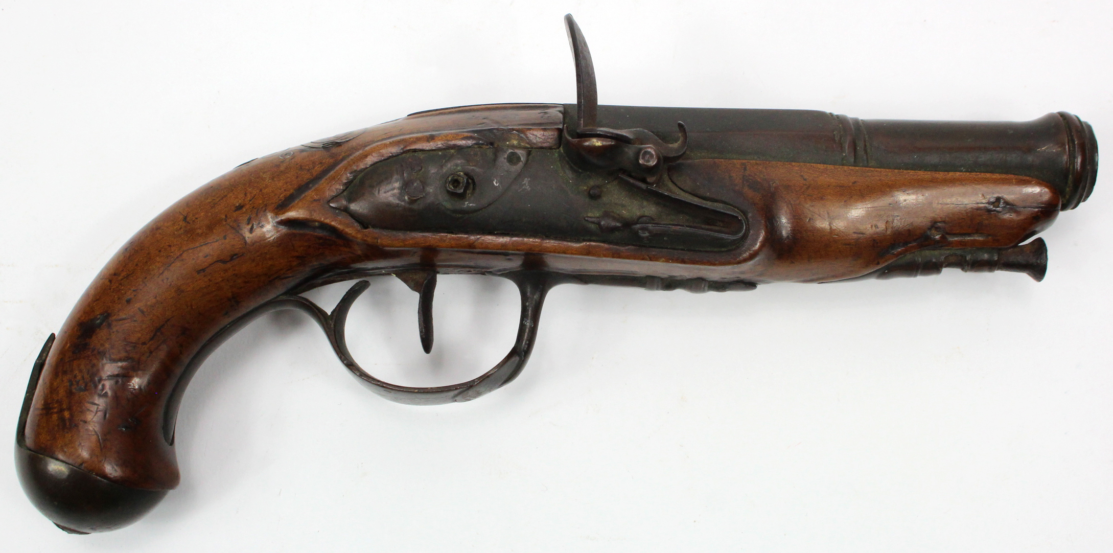 Continental flintlock pocket pistol. Part octagonal, part round canon barrel with swamped muzzle.