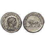 Caracalla silver antoninianus reverse:- Radiate lion walking left, holding thunderbolt in its