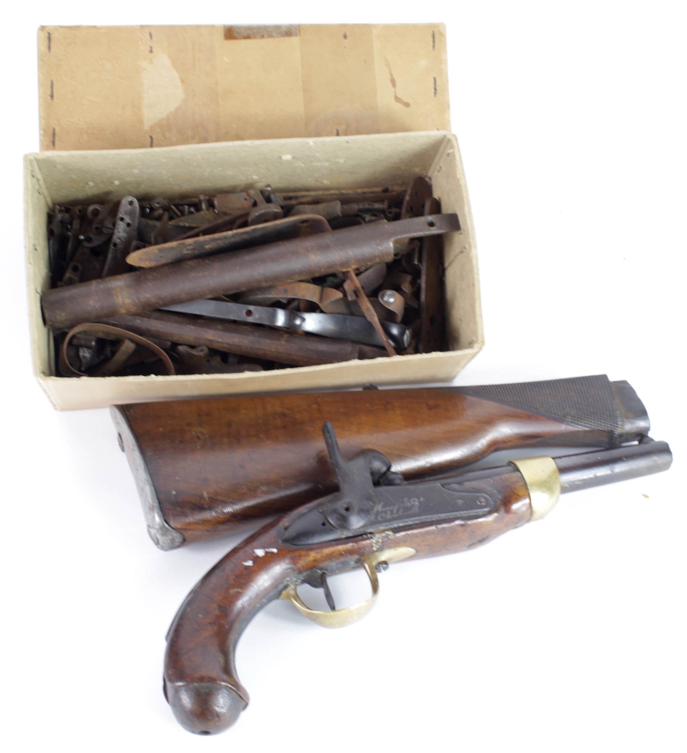 Gun parts box full of locks barrels some early parts with the stock of
