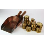 Banking Memorabilia: A quantity of large coin weights and coin shovels.